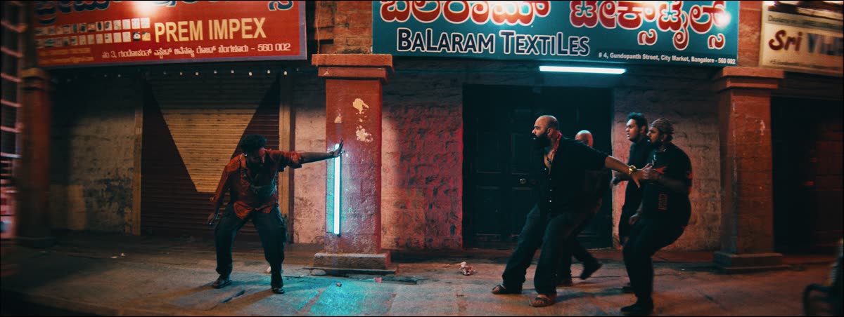 A night fight outside shuttered shops in KR Market